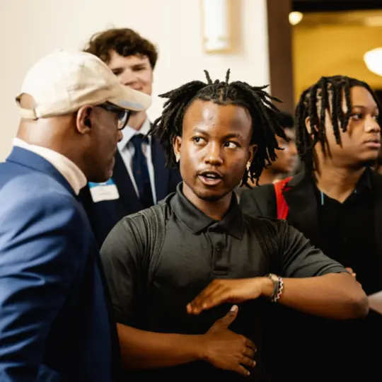 student in conversation with Bernard Bell